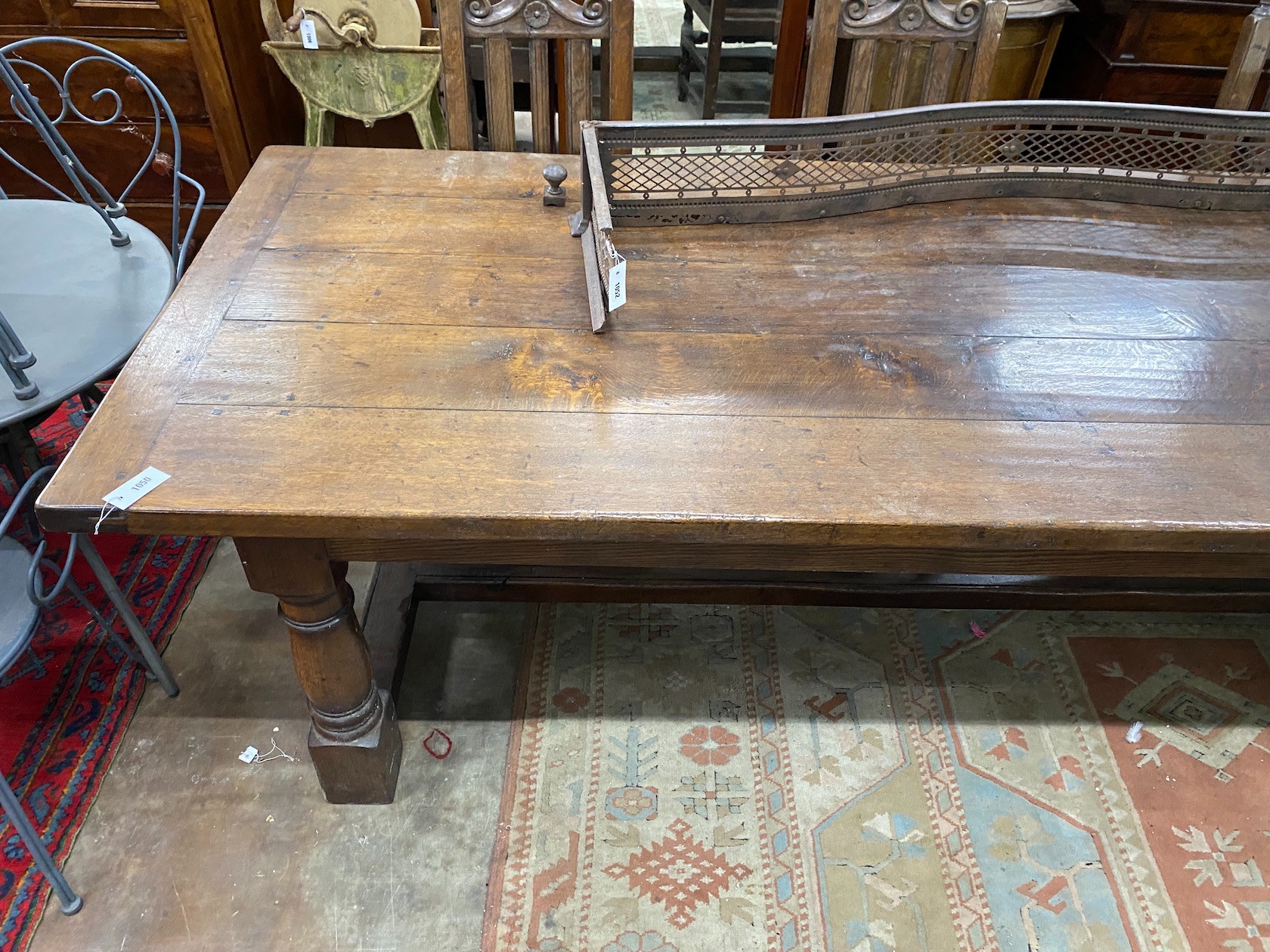 An 18th century style rectangular oak refectory dining table, length 259cm, width 101cm, height 76cm
